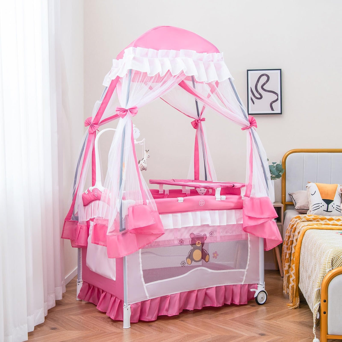 4-in-1 Pack and Play with Canopy, Changing Table and Bassinet, Hot Pink B555