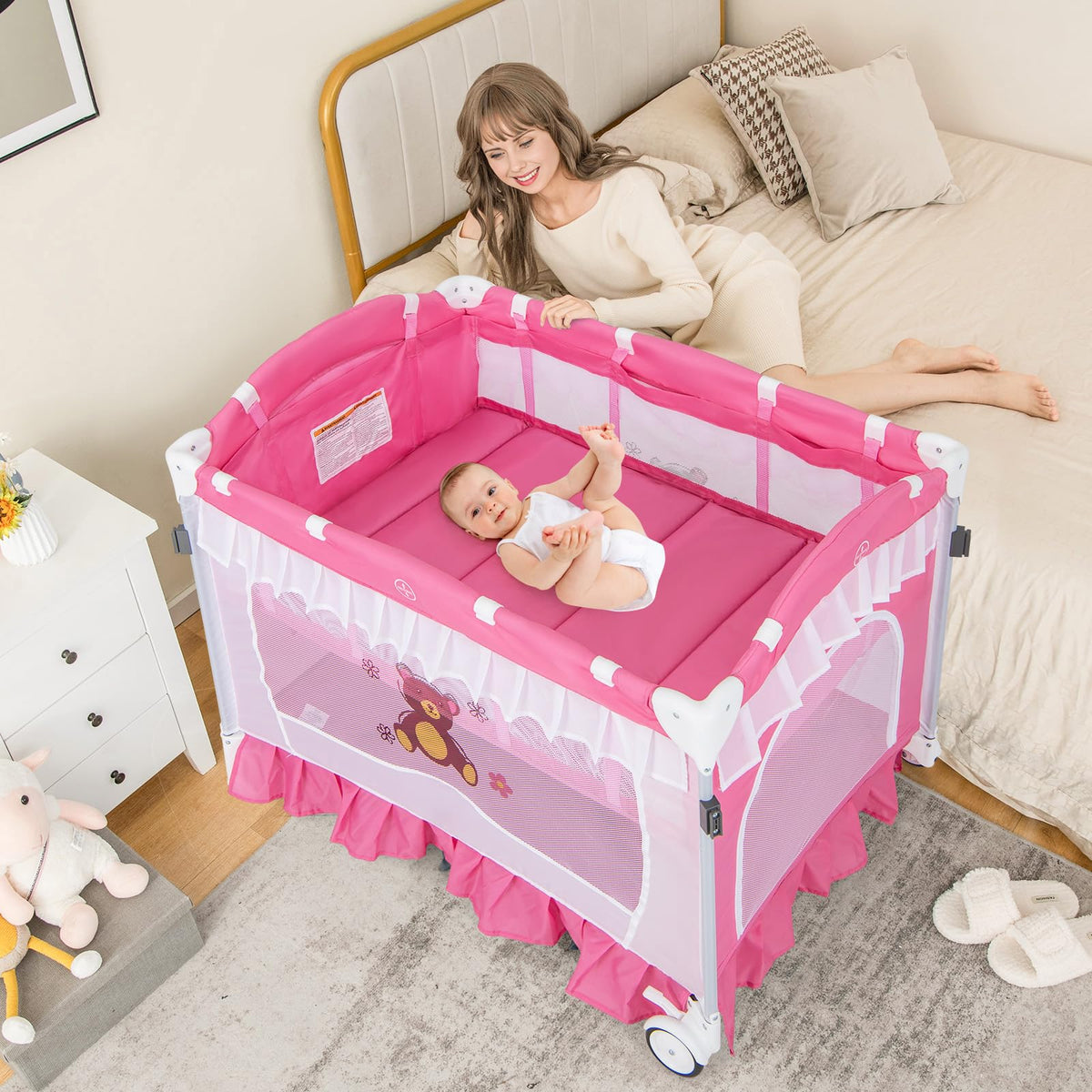 4-in-1 Pack and Play with Canopy, Changing Table and Bassinet, Hot Pink B555